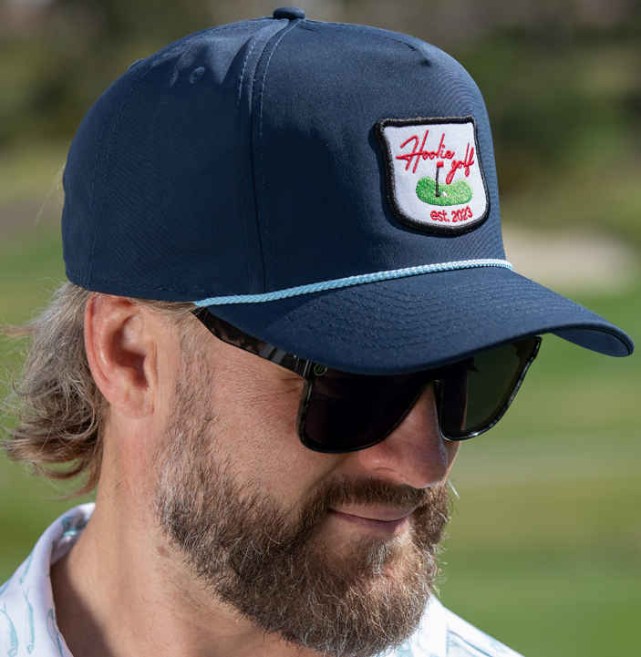 Men's Navy Blue Hoolie Golf Hat Roper with rope detail and Hoolie Golf Club patch.
