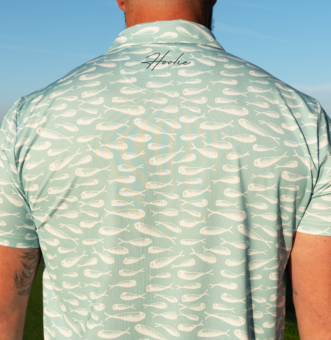 Performance Men's Golf Polo with nautical design in crystal blue