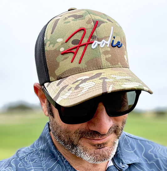 RWB Camo Men’s Golf Hat with embroidered HOOLIE logo in red, white, and blue.