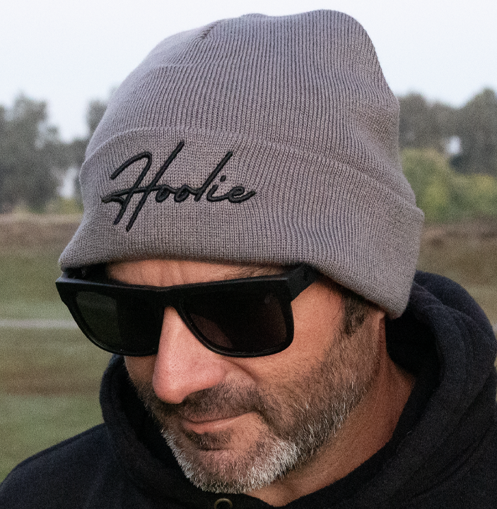 Gray knit men’s golf beanie featuring Hoolie logo front embroidery
