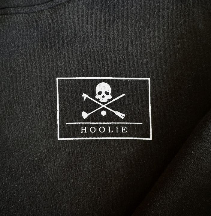 Men's Golf Hoodie in black featuring Hoolie Roger skull-and-crossbones design.