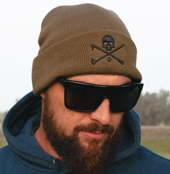 Olive knit men’s golf beanie featuring Hoolie’s X Bones emblem
