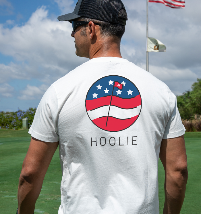 Golf T Shirt for Men with stars and stripes Flag Badge and trident-inspired detail.