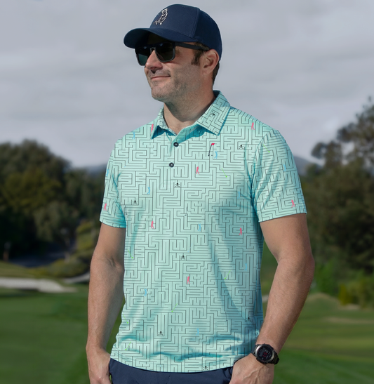 Man wearing a Maze Men's Golf Polo in Aqua with maze pattern and golfer silhouettes