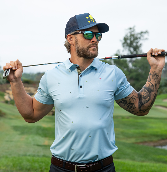 Ode to Action Guys Polo + Blue X Bones Hat Men’s Polo and Hat Bundle with commando-inspired polo and trucker hat.