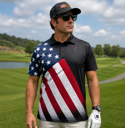 Man on golf course wearing a patriotic Men's Black Golf Polo shirt with American flag design with Declaration of Independence overlay on the polo.